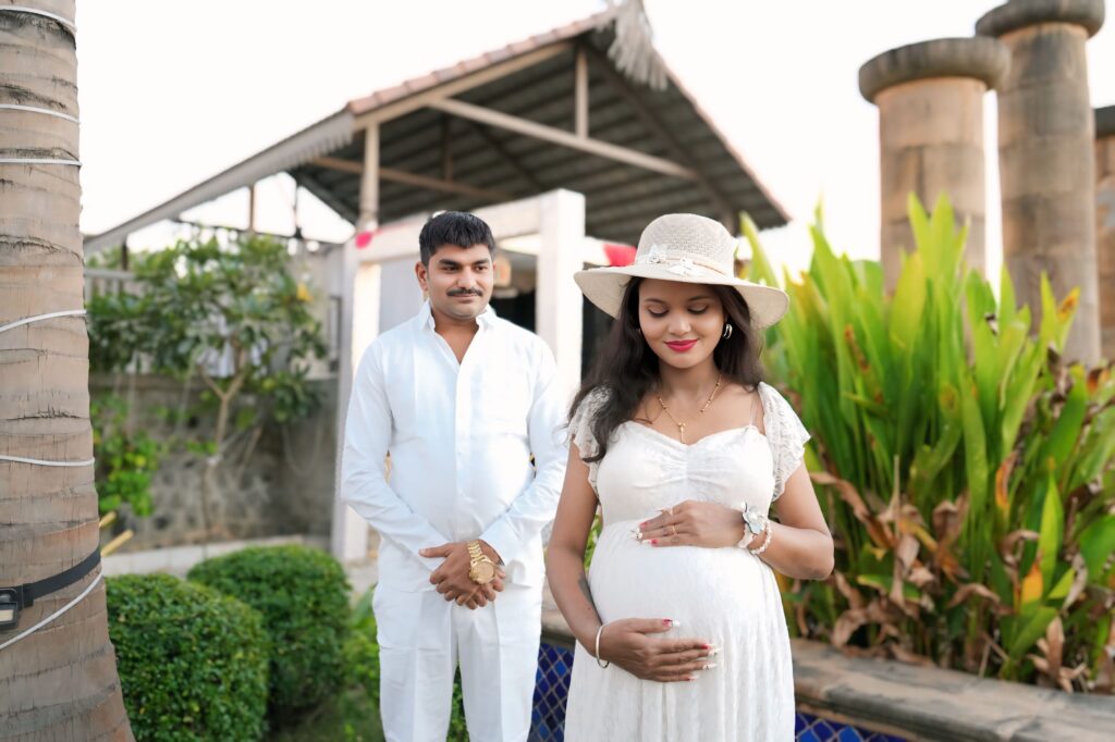 Premium maternity photoshoot at MatBaby Pictora studio in Nagpur featuring elegant baby bump portrait with professional lighting and designer gown